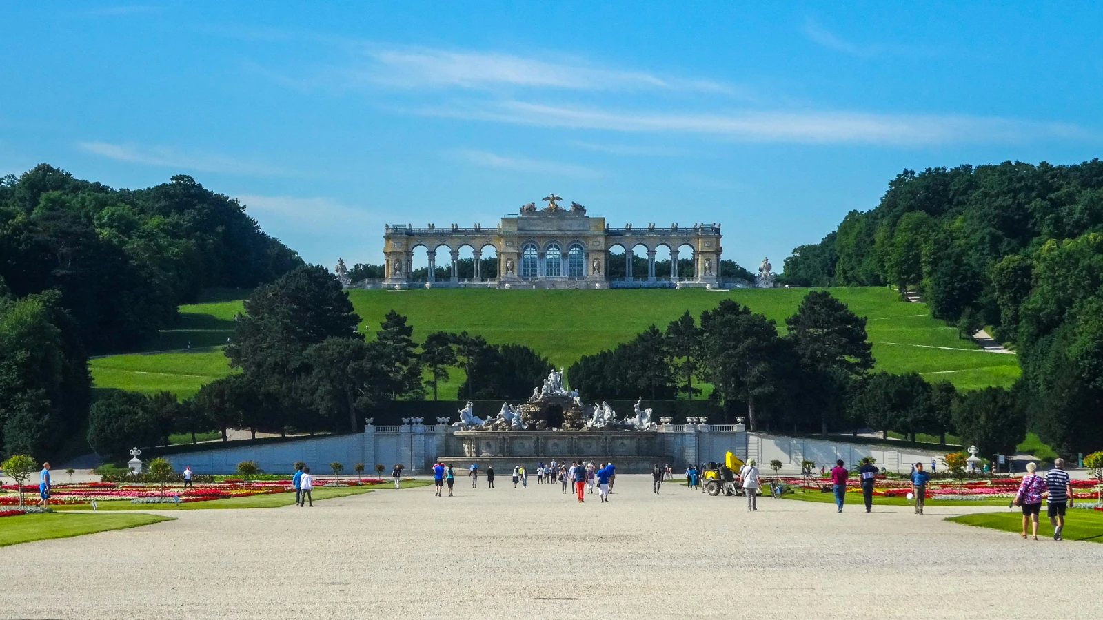 Families walking at Schönbrunn Palace Vienna - ideal for a car rental day trip with kids
